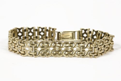 Lot 1020 - A 9ct gold two row cross link chain bracelet