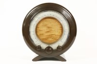 Lot 1385 - An Ekco type A22 circular brown bakelite radio