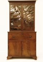 Lot 1606 - A George III mahogany and boxwood inlaid secretaire bookcase