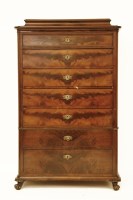 Lot 1627 - A continental mahogany seven drawer chest
