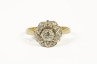 Lot 1005 - A gold diamond cluster ring