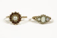 Lot 1034 - A 9ct gold opal and diamond triple cluster ring