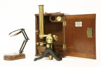 Lot 1238 - A brass microscope