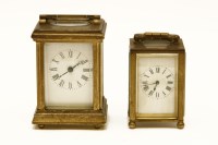 Lot 1206 - Two miniature carriage brass clocks