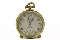 Lot 1217 - A Zenith watch Company alarm clock with a silvered dial