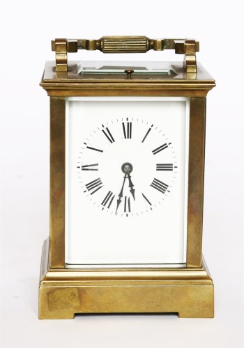 Lot 32 - A brass carriage clock