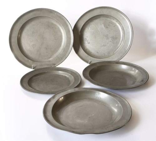 Lot 40 - A pair of pewter dishes and a charger