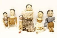 Lot 1230 - Six carved pine and painted dolls