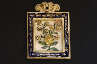 Lot 1205 - An early 19th century pottery floral plaque