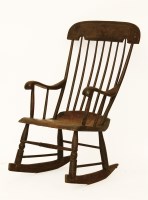 Lot 1717 - A 19th century painted stick back rocking chair