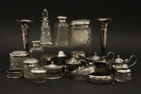 Lot 1163 - A small quantity of silver items to include a pair of posy vases