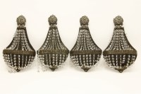 Lot 1621 - A set of four early 20th century brass wall lights