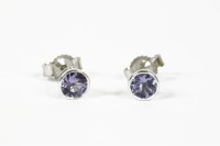 Lot 1090 - A pair of single stone tanzanite stud earrings