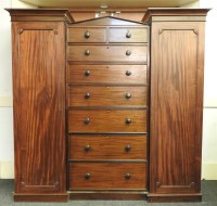 Lot 1643 - A Victorian mahogany inverted break front gents compactum wardrobe