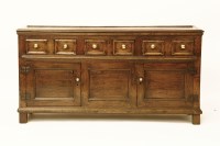 Lot 1694 - A George III oak dresser base