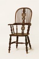 Lot 1629 - A 19th century yew wood and elm seated Windsor chair