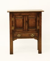 Lot 1789 - A small George III style oak cupboard