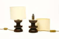Lot 1283 - A pair of turned possibly lignum vitae and silver mounted table lamps
