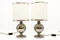 Lot 1394 - A pair of nickel plated table lamps