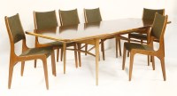 Lot 251 - A rosewood and teak dining table