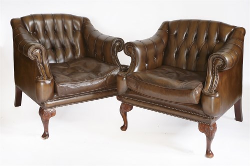 Lot 51 - A pair of modern brown leather armchairs