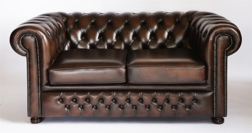 Lot 52 - A pair of modern brown leather two-seat chesterfield settees