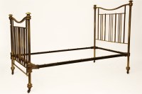 Lot 1714 - A Victorian brass double bedstead with slated panels on turned columns