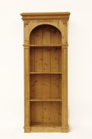 Lot 1771 - A Pine open book case with carved detail