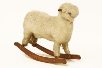 Lot 1384A - A sheepskin covered rocking sheep