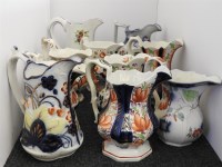 Lot 343 - A collection of ten Gaudy Welsh jugs of varying designs and sizes
