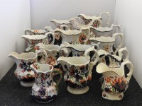 Lot 356 - A large collection of Gaudy Welsh jugs of varying designs and sizes