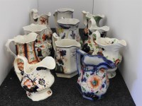 Lot 341 - A collection of Gaudy Welsh jugs of varying designs and sizes