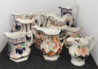 Lot 375 - A collection of Gaudy Welsh jugs of varying designs and sizes