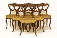 Lot 661 - A set of six Victorian simulated rosewood single dining chairs