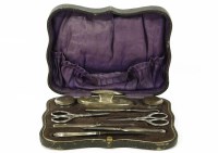 Lot 161 - A cased silver mounted manicure set