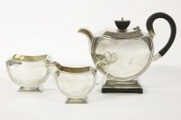 Lot 172 - A silver three piece tea set. by Walker and Hall