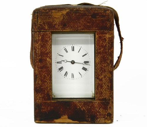 Lot 200 - A late 19th century brass carriage clock in fitted case