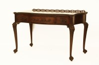 Lot 577 - A George ll style mahogany serpentine fronted side table