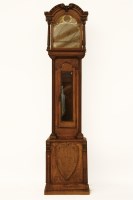 Lot 643 - A late 19th century oak longcase clock