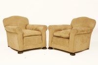 Lot 711 - A pair of 1920's club armchairs