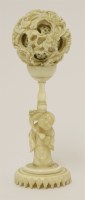 Lot 119 - A Canton ivory ball and stand
