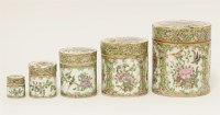 Lot 242 - A nest of five Chinese Canton famille rose boxes and covers