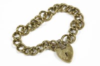 Lot 18 - A 9ct gold curb link bracelet with padlock
34.81g