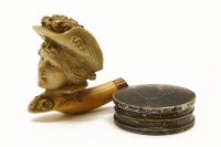 Lot 124 - A Meerschaum pipe modelled as a lady wearing a hat