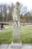 Lot 725 - A reconstituted stone figures of a child centurions