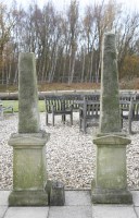 Lot 726 - A pair of reconstituted stone garden obelisks