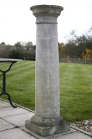 Lot 728 - A reconstituted stone column on plinth base