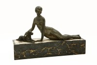 Lot 273 - An Art Deco spelter group of a girl reclining with a dog