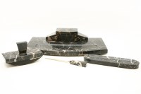 Lot 233 - An Art Deco black marble writing desk Standish fitted twin inkwell with glass inks