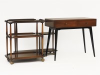 Lot 613 - Two Ercol three tiered trolleys